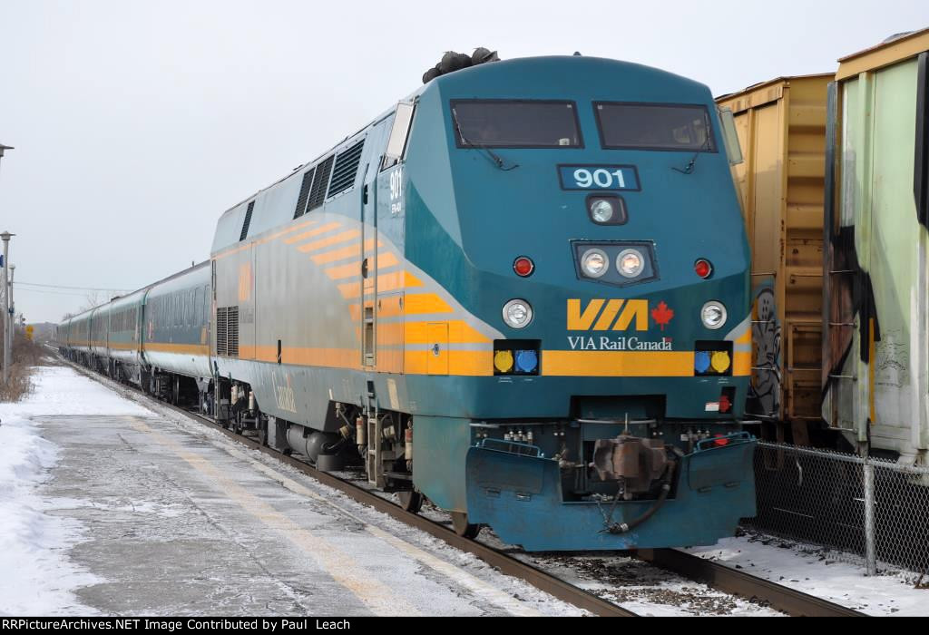 Eastbound Corridor passenger train eases into the station for its stop